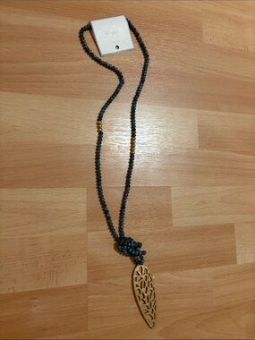 Women's Black Beaded Necklace with Gold Filigree Leaf Pendant
